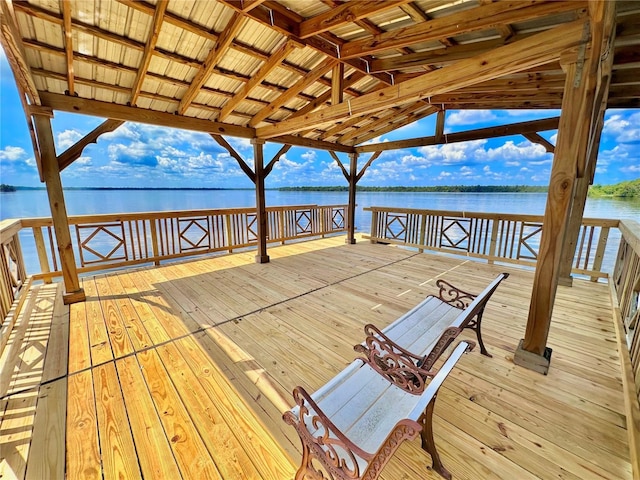 dock area with a deck with water view