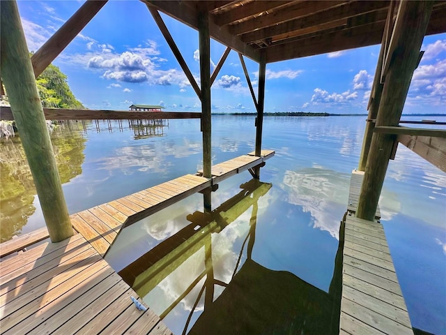 view of dock with a water view