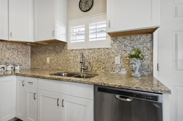 kitchen featuring sink, white cabinets, and stainless steel dishwasher