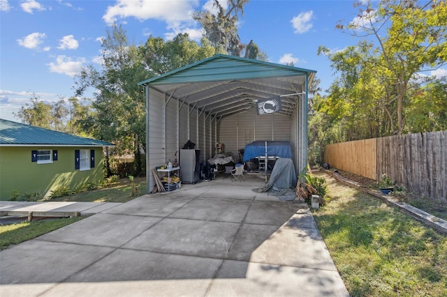 view of vehicle parking with a carport