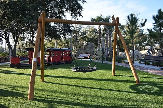 view of play area with a yard