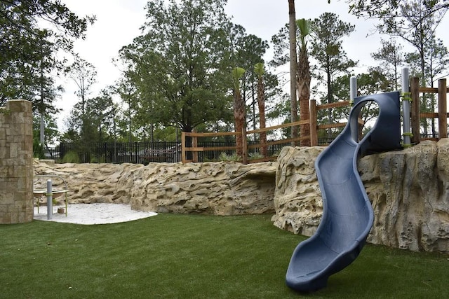 view of play area with a yard