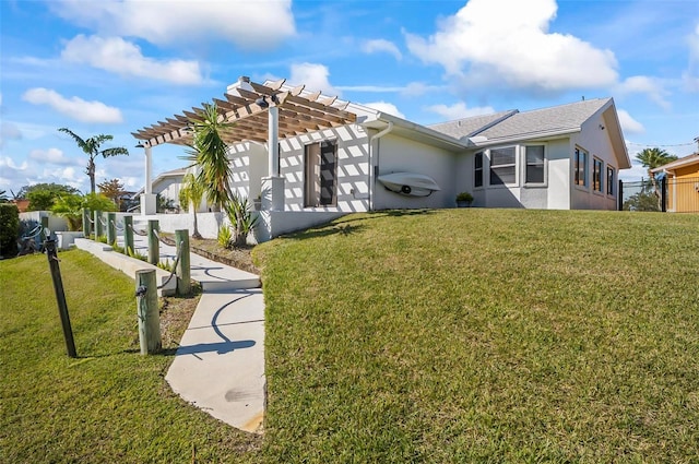 view of property exterior featuring a pergola and a yard