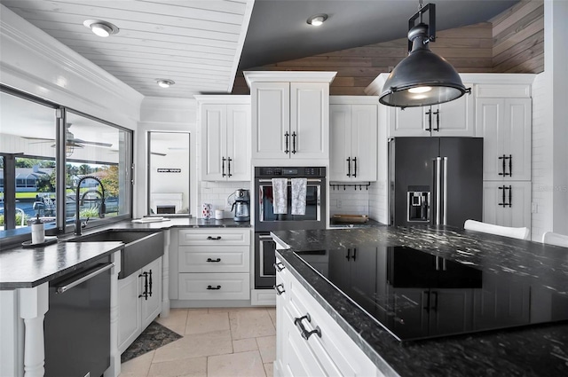 kitchen with white cabinets, sink, and appliances with stainless steel finishes