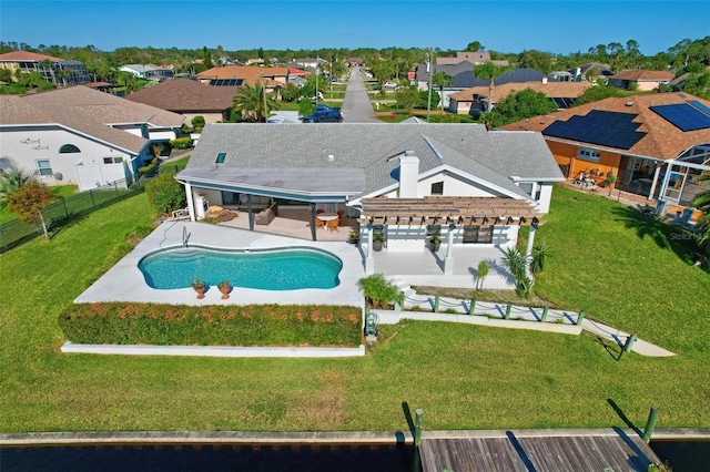 view of pool with a pergola, a lawn, and a patio