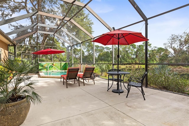 view of patio / terrace with a lanai