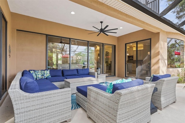 view of patio featuring outdoor lounge area and ceiling fan