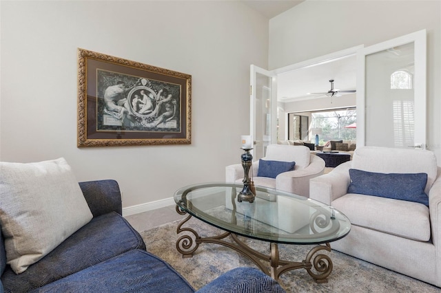 living room featuring ceiling fan