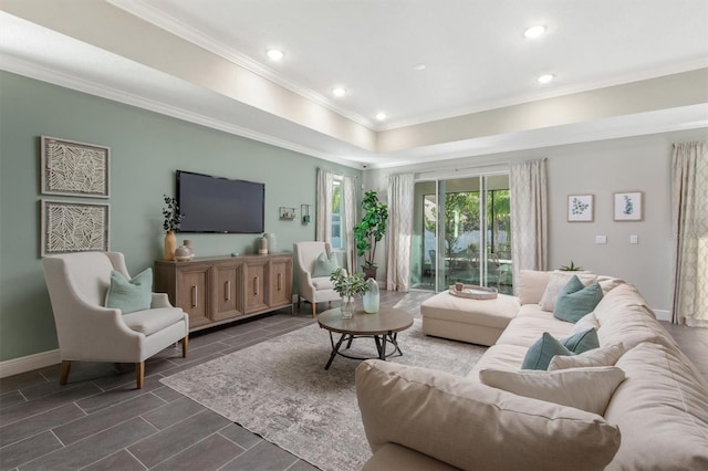 living room featuring dark hardwood / wood-style floors and ornamental molding