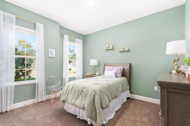 2214 Elegant Manor Cir, Edgewater, FL 32141 - carpeted bedroom featuring baseboards