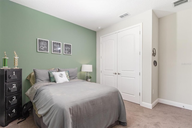 2214 Elegant Manor Cir, Edgewater, FL 32141 - carpeted bedroom featuring a closet and baseboards