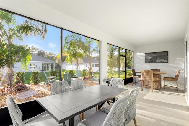 2214 Elegant Manor Cir, Edgewater, FL 32141 - sunroom with outdoor dining space