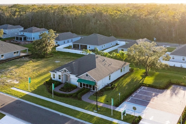 2214 Elegant Manor Cir, Edgewater, FL 32141 - aerial view of residential area featuring a forest