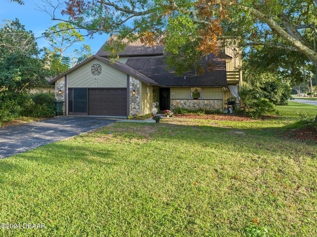 ranch-style house with a front yard and a garage