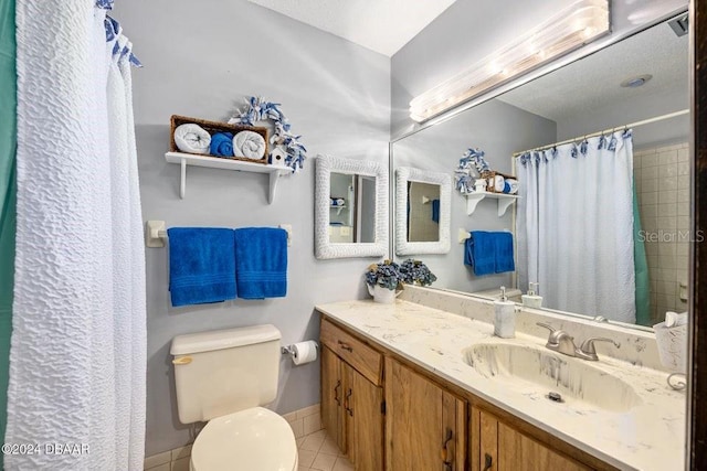 bathroom featuring tile patterned floors, curtained shower, toilet, and vanity