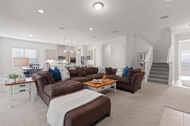 living room with light colored carpet