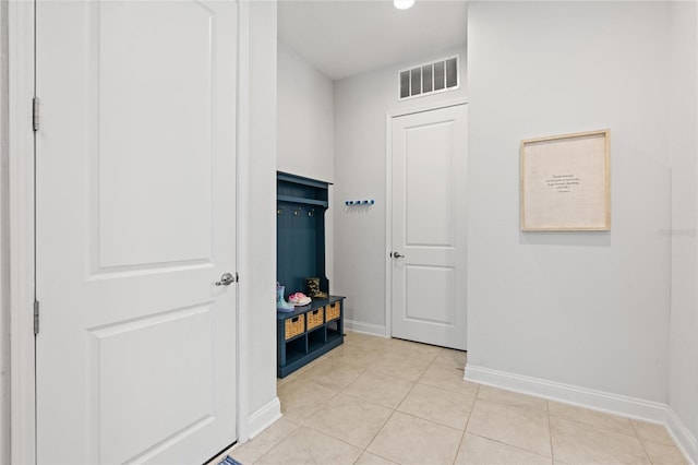 interior space featuring light tile patterned floors