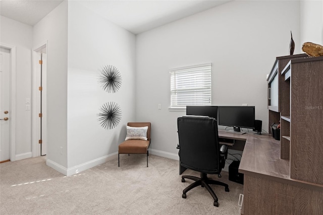 home office featuring light carpet