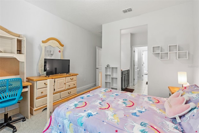 bedroom with light colored carpet