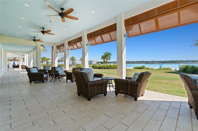 view of patio / terrace with a water view