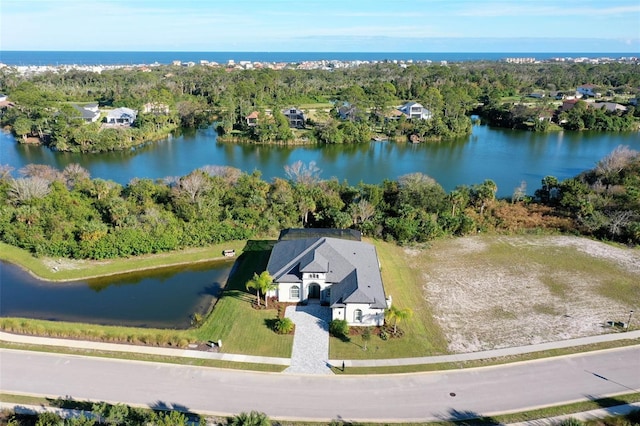 drone / aerial view featuring a water view