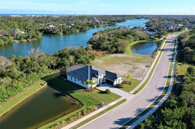 drone / aerial view with a water view