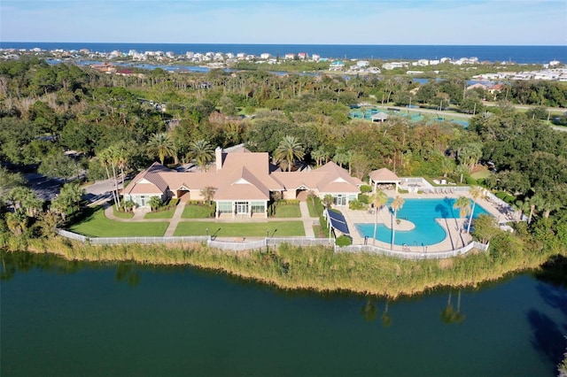 birds eye view of property featuring a water view