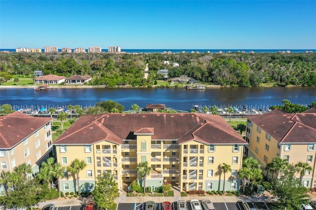 drone / aerial view featuring a water view