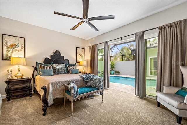 carpeted bedroom with ceiling fan and access to outside