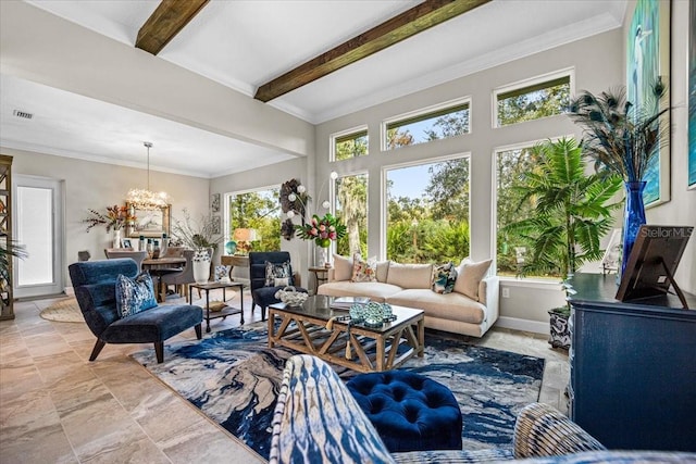 sunroom featuring plenty of natural light, beam ceiling, and a chandelier