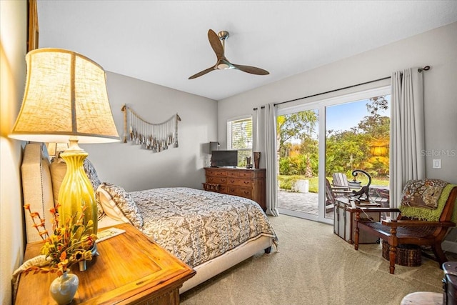 bedroom featuring ceiling fan, access to exterior, and carpet floors