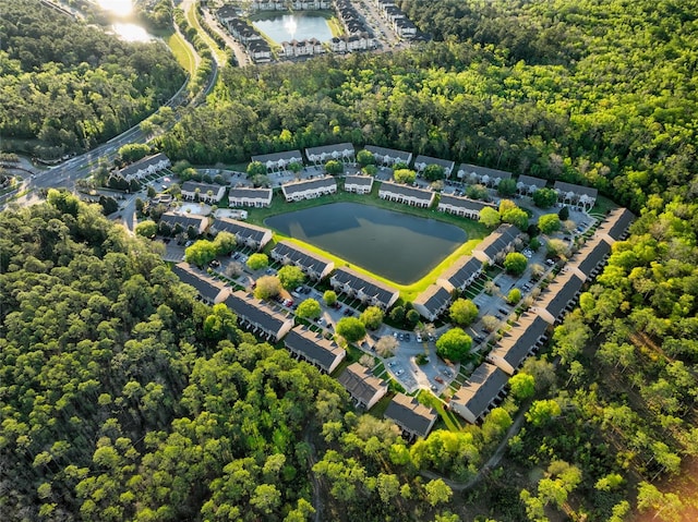 drone / aerial view with a water view