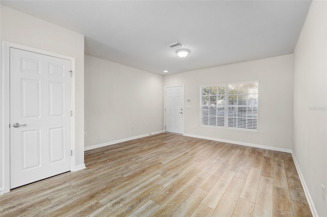 empty room featuring light hardwood / wood-style floors