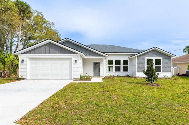 34 Bannbury Ln, Palm Coast, FL 32137 - ranch-style house with a front yard and a garage