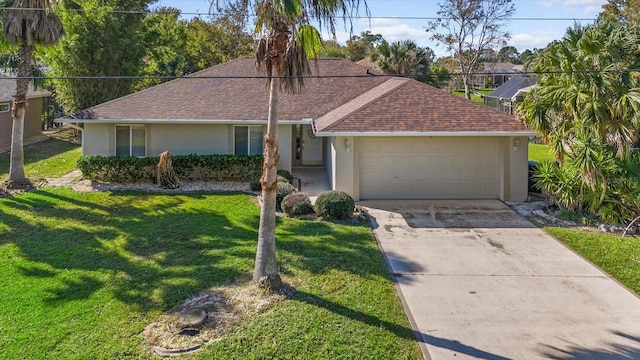 single story home with a garage and a front yard