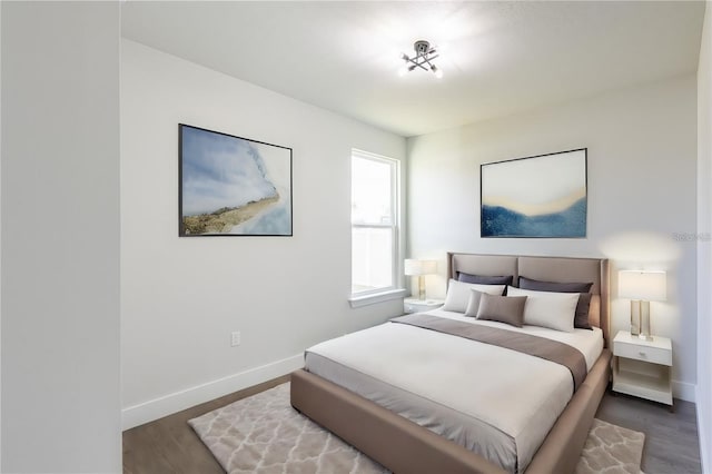 bedroom featuring dark wood-type flooring