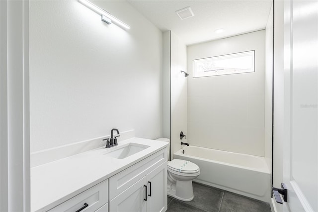 full bathroom featuring tile patterned flooring, vanity, tub / shower combination, and toilet