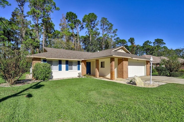 single story home with a garage and a front lawn