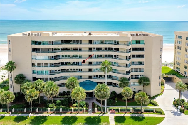 view of property with a water view