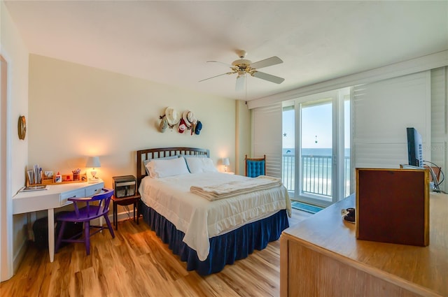 bedroom with ceiling fan, light hardwood / wood-style floors, and access to exterior