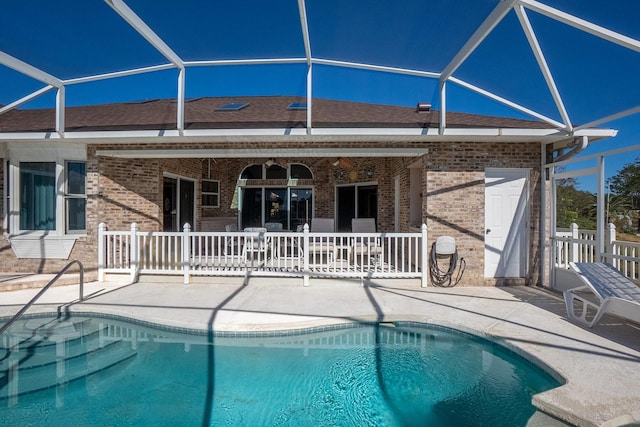 view of pool featuring a lanai and a patio area