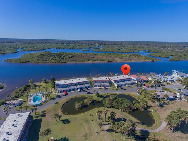 bird's eye view with a water view