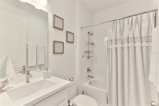 full bathroom featuring shower / bath combo, toilet, and vanity