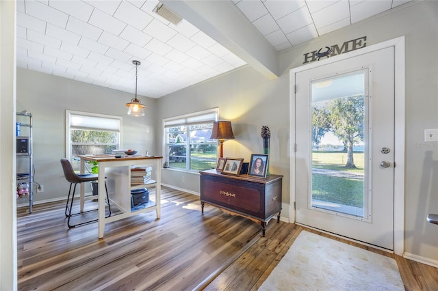 entrance foyer featuring dark hardwood / wood-style floors