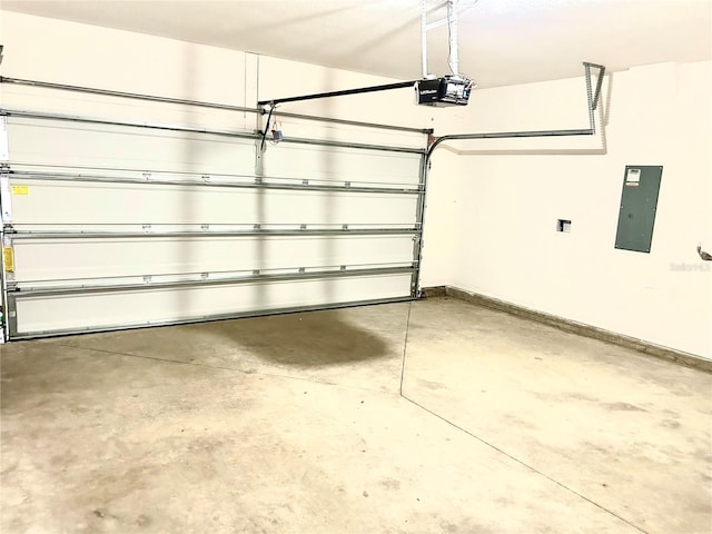 garage with electric panel and a garage door opener