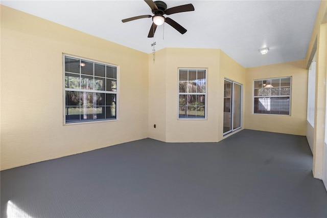 view of patio featuring ceiling fan