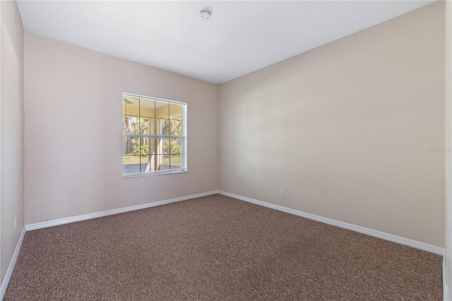 spare room featuring carpet flooring