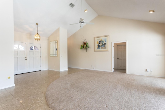 foyer featuring ceiling fan and high vaulted ceiling