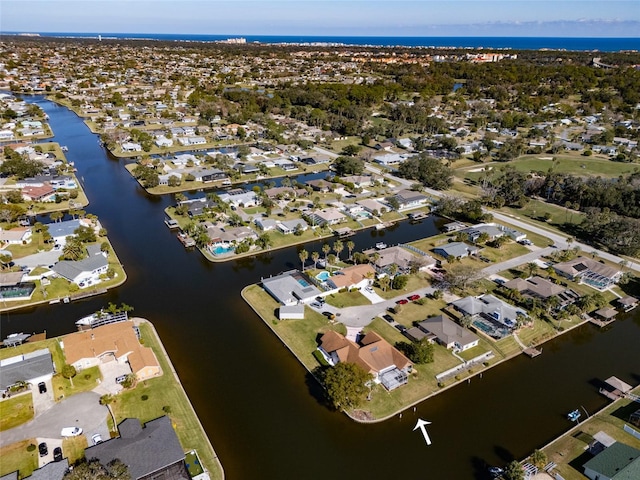 bird's eye view with a water view