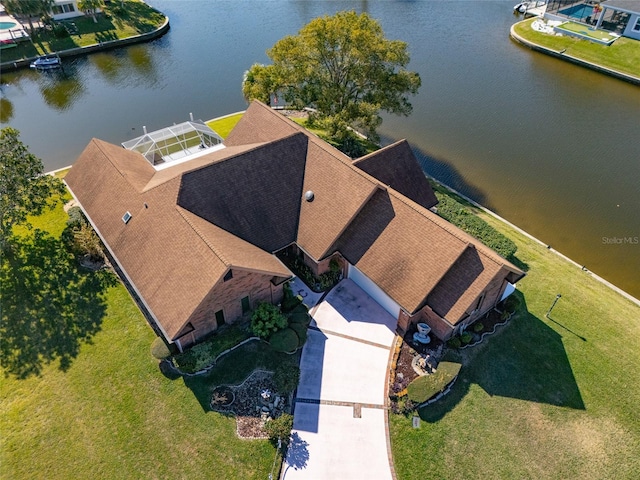 drone / aerial view with a water view